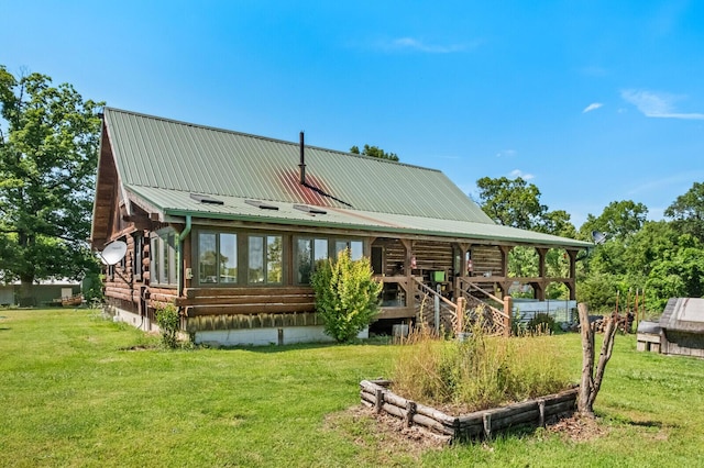 447 Flint Ln, Washburn, MO 65772 - back of house with log exterior, a lawn, and metal roof