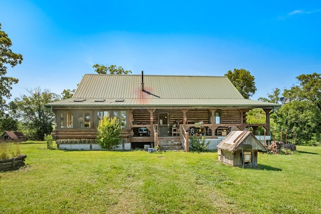 447 Flint Ln, Washburn, MO 65772 - rear view of property with log siding, a lawn, metal roof, and covered porch