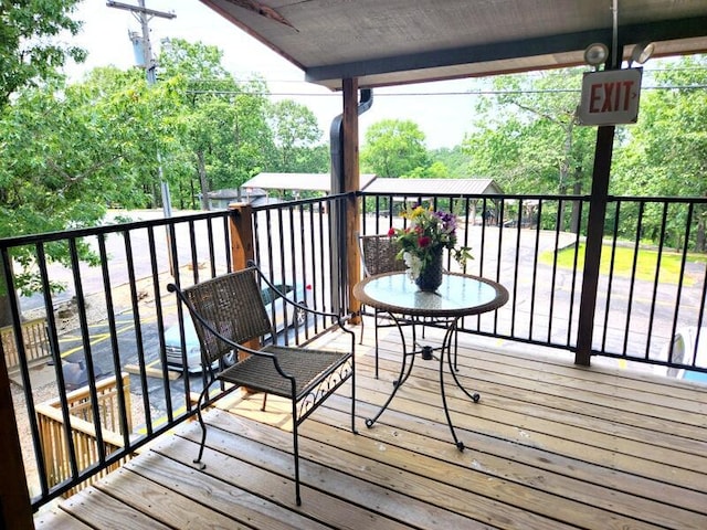 388 Notch Ln Unit 12, Branson West, MO 65737 - wooden terrace featuring view of scattered trees