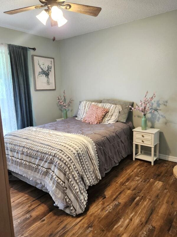 388 Notch Ln Unit 12, Branson West, MO 65737 - bedroom with wood finished floors, ceiling fan, and baseboards