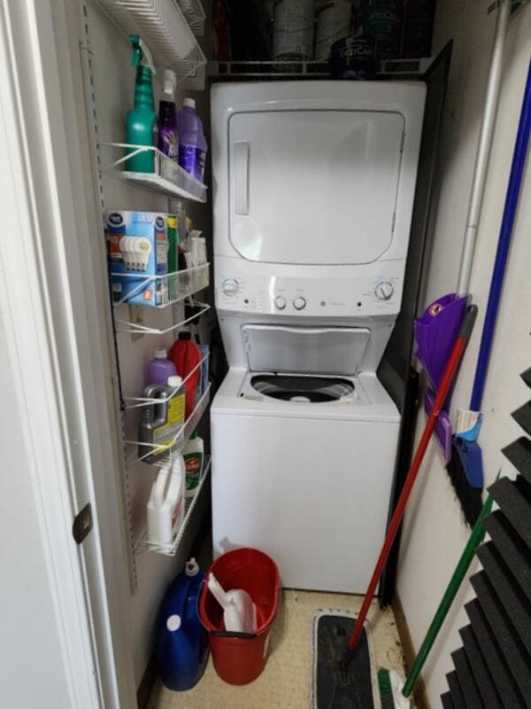388 Notch Ln Unit 12, Branson West, MO 65737 - laundry area with stacked washing machine and dryer