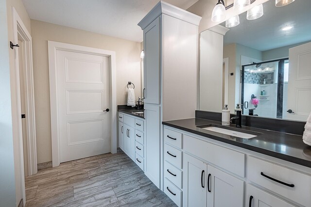 2370 E Cardinal St, Springfield, MO 65804 - bathroom with vanity and a stall shower