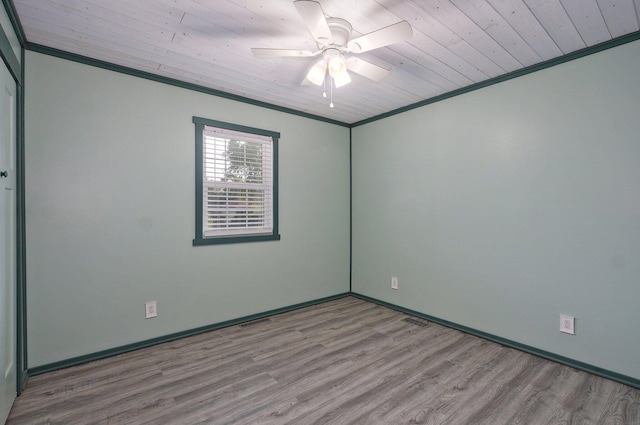 1132 Irene Ct, Nixa, MO 65714 - spare room with wood finished floors, wooden ceiling, crown molding, baseboards, and ceiling fan