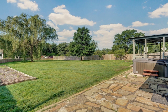 1132 Irene Ct, Nixa, MO 65714 - view of yard with a hot tub and a patio