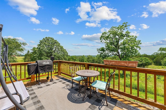 28286 Clay Rd, Eagle Rock, MO 65641 - deck with grilling area and outdoor dining space