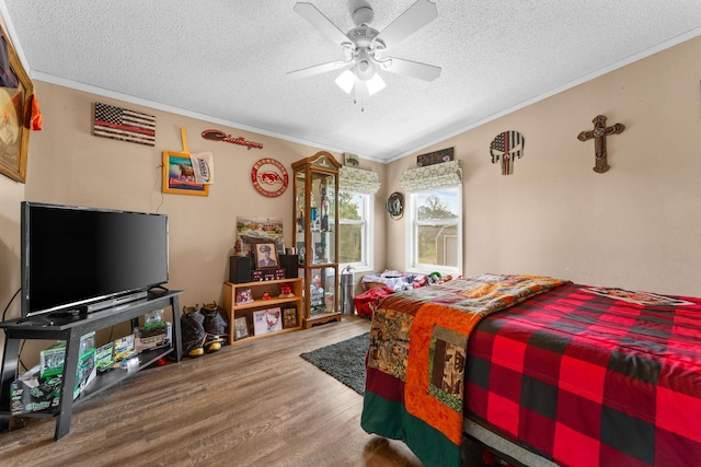 28286 Clay Rd, Eagle Rock, MO 65641 - bedroom featuring a textured ceiling, wood finished floors, ornamental molding, and ceiling fan