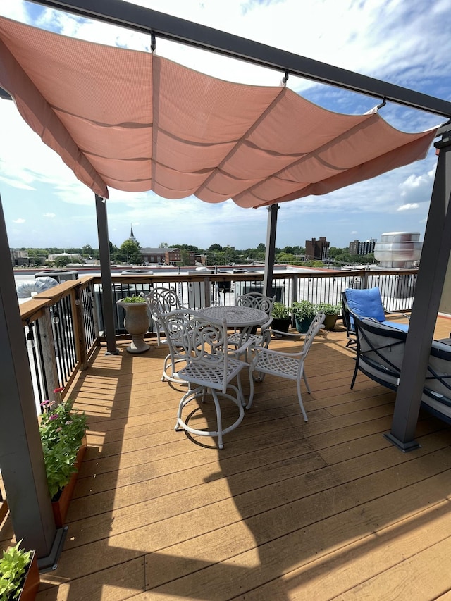 deck featuring a water view