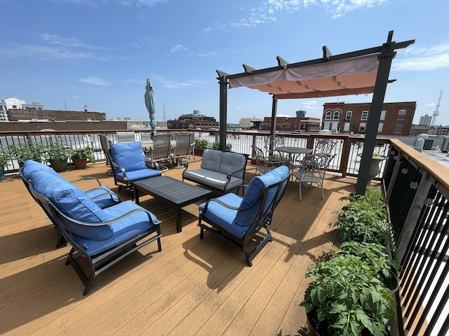 wooden terrace with outdoor lounge area and a view of city