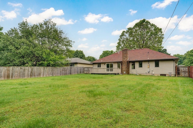 1436 W Whiteside St, Springfield, MO 65807 - rear view of house featuring a chimney and a deck