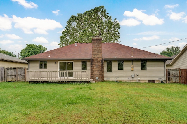 1436 W Whiteside St, Springfield, MO 65807 - back of property featuring a chimney and a deck