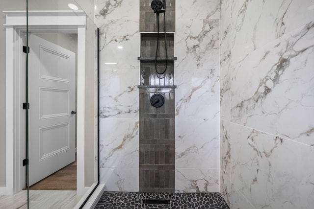 1691 S Charles Pl, Bolivar, MO 65613 - bathroom featuring a marble finish shower