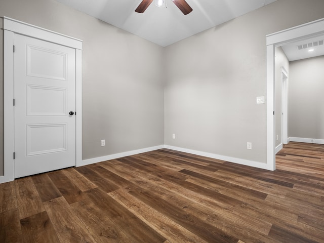 1691 S Charles Pl, Bolivar, MO 65613 - unfurnished room featuring a ceiling fan, dark wood-style flooring, and baseboards