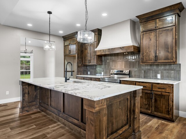 1691 S Charles Pl, Bolivar, MO 65613 - kitchen with stainless steel electric range oven, custom exhaust hood, a sink, baseboards, and dark wood-type flooring