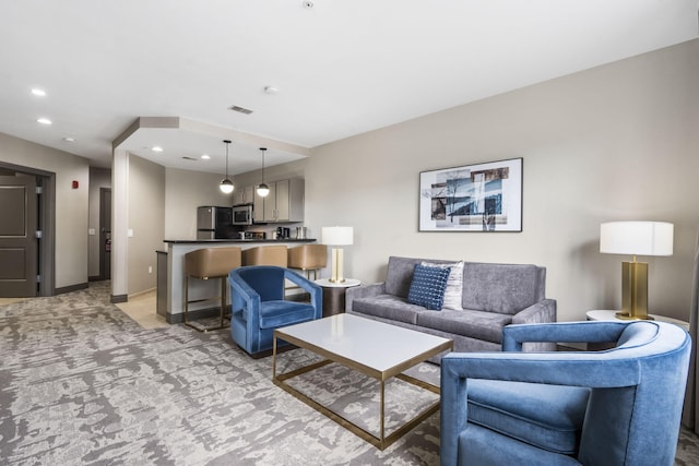 2204A Branson Landing Blvd, Branson, MO 65616 - living room featuring recessed lighting, baseboards, and light carpet