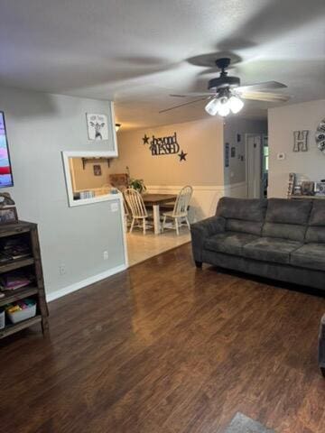 9153 N Hwy Highway, Mountain Grove, MO 65711 - living area with ceiling fan, wood finished floors, and baseboards