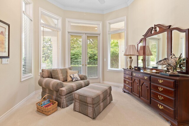 193 Honeybee Dr, Branson, MO 65615 - living area with light colored carpet, ceiling fan, baseboards, plenty of natural light, and ornamental molding