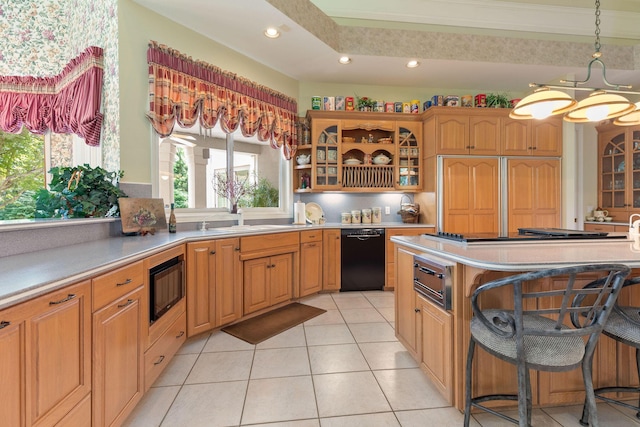 193 Honeybee Dr, Branson, MO 65615 - kitchen featuring built in appliances, a sink, a chandelier, glass insert cabinets, and light countertops