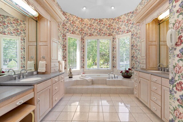 193 Honeybee Dr, Branson, MO 65615 - bathroom featuring wallpapered walls, plenty of natural light, vanity, a garden tub, and tile patterned flooring