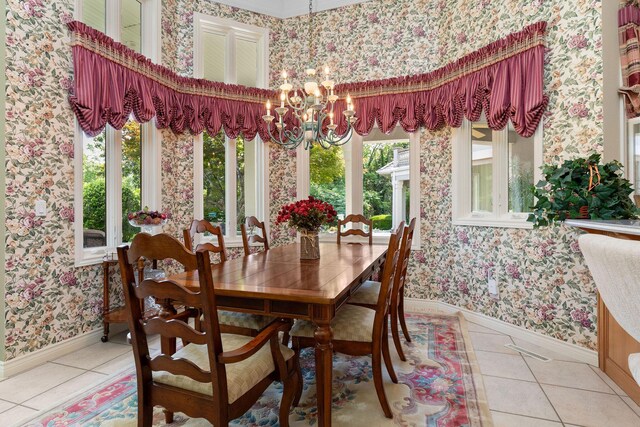 193 Honeybee Dr, Branson, MO 65615 - dining room featuring wallpapered walls, light tile patterned floors, a chandelier, and baseboards