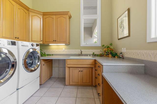 193 Honeybee Dr, Branson, MO 65615 - laundry room with separate washer and dryer, cabinet space, and light tile patterned floors
