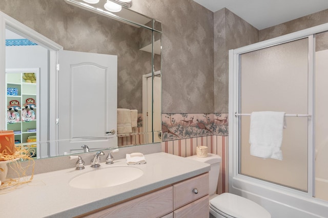 193 Honeybee Dr, Branson, MO 65615 - full bath featuring vanity, toilet, and enclosed tub / shower combo