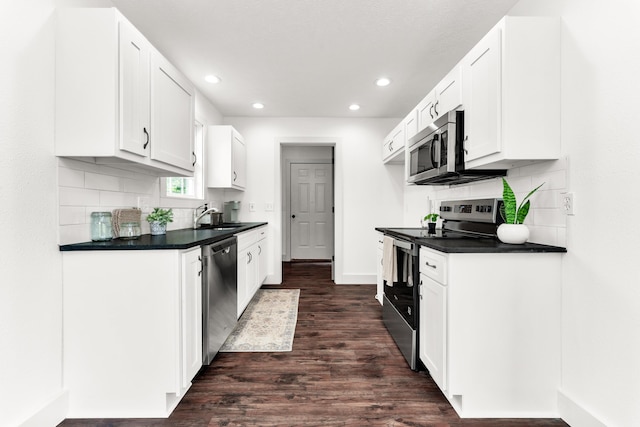 524 W Woodbine Rd, Nixa, MO 65714 - kitchen featuring stainless steel appliances, dark countertops, recessed lighting, tasteful backsplash, and white cabinets