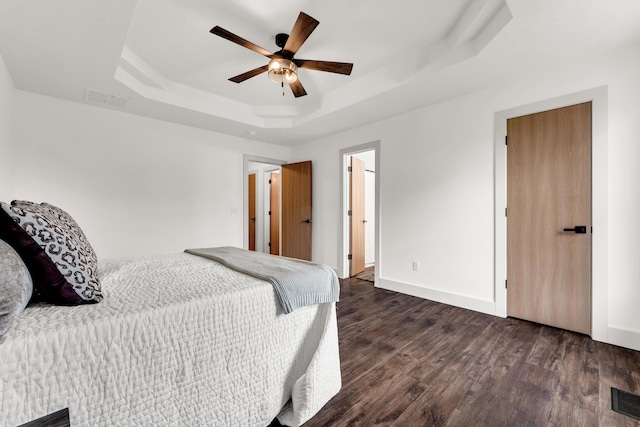 524 W Woodbine Rd, Nixa, MO 65714 - bedroom featuring a raised ceiling, wood finished floors, baseboards, and a ceiling fan