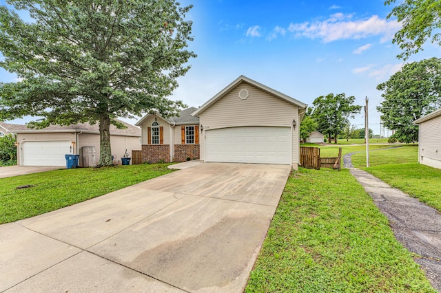 524 W Woodbine Rd, Nixa, MO 65714 - view of front of house featuring concrete driveway, a front lawn, an attached garage, and brick siding