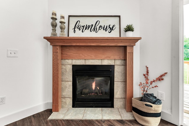 524 W Woodbine Rd, Nixa, MO 65714 - detailed view of a fireplace, wood finished floors, and baseboards