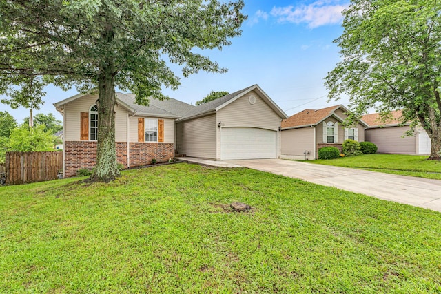 524 W Woodbine Rd, Nixa, MO 65714 - single story home with concrete driveway, a garage, and brick siding