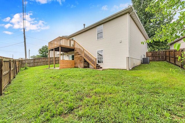 524 W Woodbine Rd, Nixa, MO 65714 - rear view of house featuring stairway, a wooden deck, and central AC