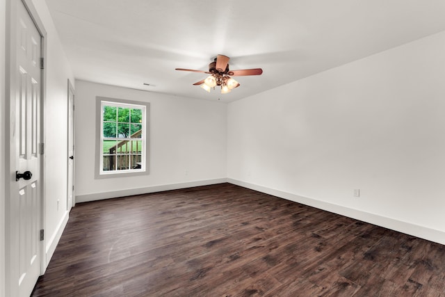 524 W Woodbine Rd, Nixa, MO 65714 - unfurnished room with ceiling fan, dark wood-style flooring, and baseboards