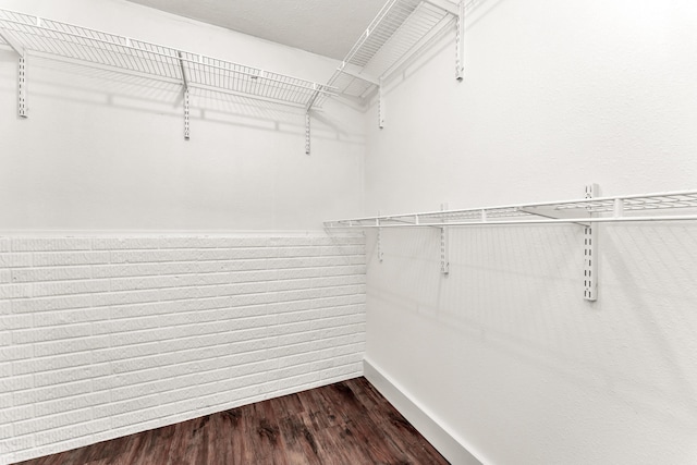 524 W Woodbine Rd, Nixa, MO 65714 - walk in closet featuring wood finished floors