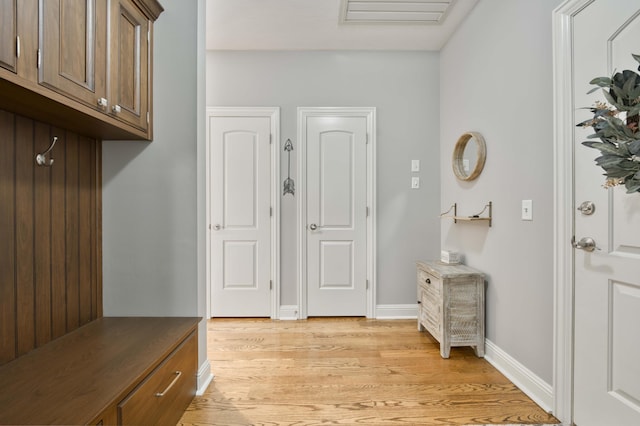 1865 N Hearthstone Ln, Strafford, MO 65757 - mudroom featuring light wood-style flooring and baseboards