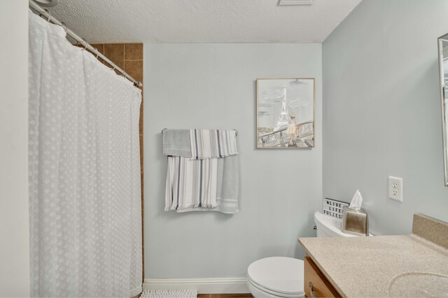 1865 N Hearthstone Ln, Strafford, MO 65757 - bathroom with vanity, toilet, curtained shower, and a textured ceiling