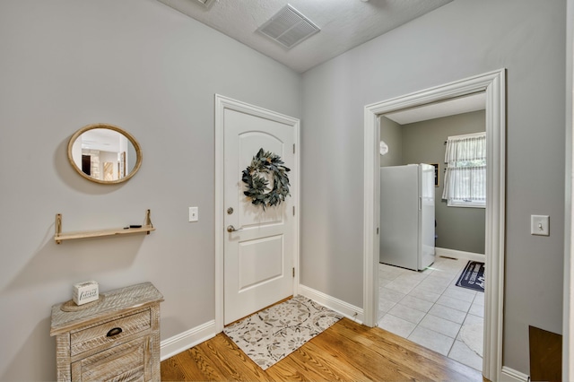 1865 N Hearthstone Ln, Strafford, MO 65757 - foyer entrance with baseboards and light wood-style flooring