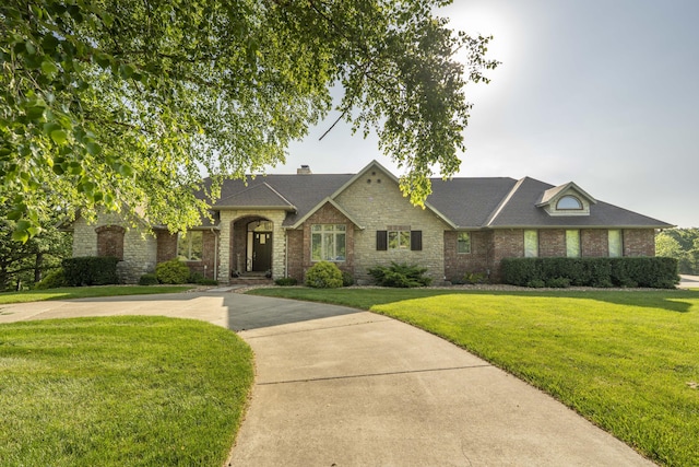1865 N Hearthstone Ln, Strafford, MO 65757 - view of front of home with a front yard, brick siding, and a shingled roof