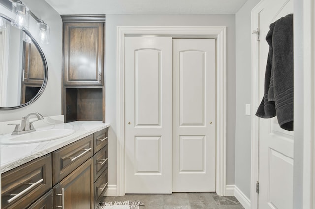1865 N Hearthstone Ln, Strafford, MO 65757 - bathroom with vanity and baseboards