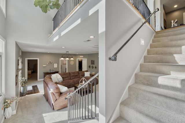1865 N Hearthstone Ln, Strafford, MO 65757 - stairway with carpet, a high ceiling, recessed lighting, and baseboards