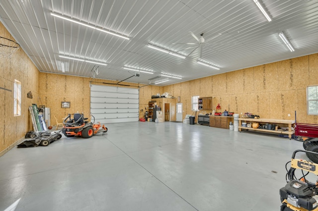 1865 N Hearthstone Ln, Strafford, MO 65757 - garage featuring a workshop area