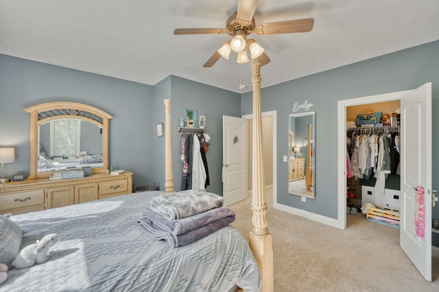 1865 N Hearthstone Ln, Strafford, MO 65757 - bedroom featuring light carpet, a walk in closet, ceiling fan, and a closet