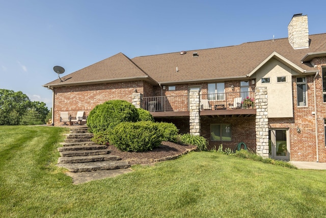 1865 N Hearthstone Ln, Strafford, MO 65757 - back of house with roof with shingles, a yard, and brick siding