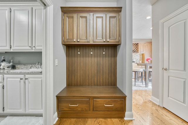 1865 N Hearthstone Ln, Strafford, MO 65757 - mudroom featuring light wood-type flooring, a sink, baseboards, and recessed lighting