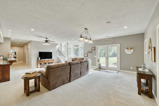 1865 N Hearthstone Ln, Strafford, MO 65757 - living area with light colored carpet, baseboards, recessed lighting, a textured ceiling, and ceiling fan