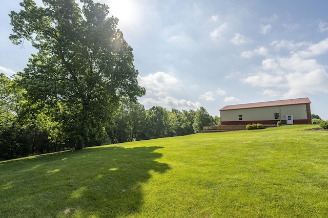 1865 N Hearthstone Ln, Strafford, MO 65757 - view of grassy yard with a pole building
