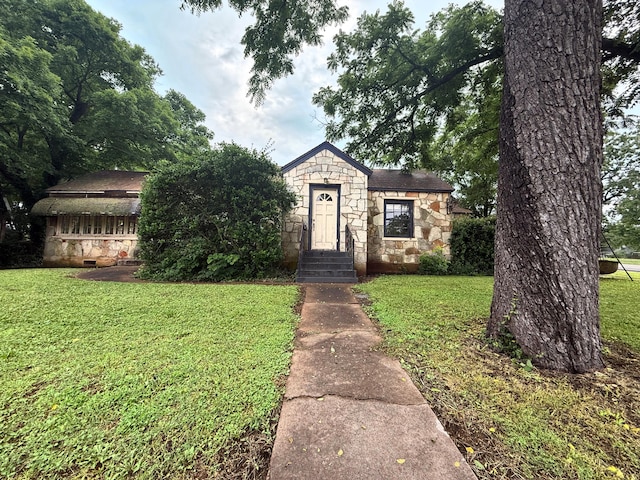 404 S 5th St, Thayer, MO 65791 - view of front of property with stone siding and a front yard