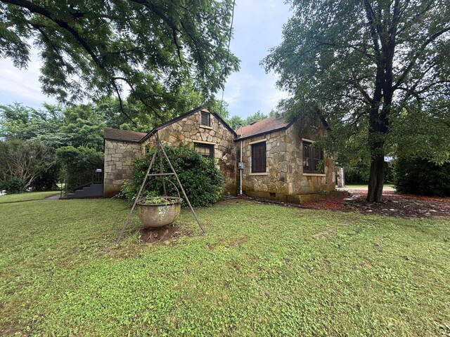 404 S 5th St, Thayer, MO 65791 - rear view of property featuring stone siding, a lawn, and crawl space