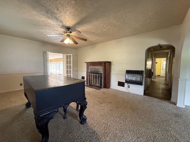 404 S 5th St, Thayer, MO 65791 - playroom with heating unit, carpet, a textured ceiling, and ceiling fan