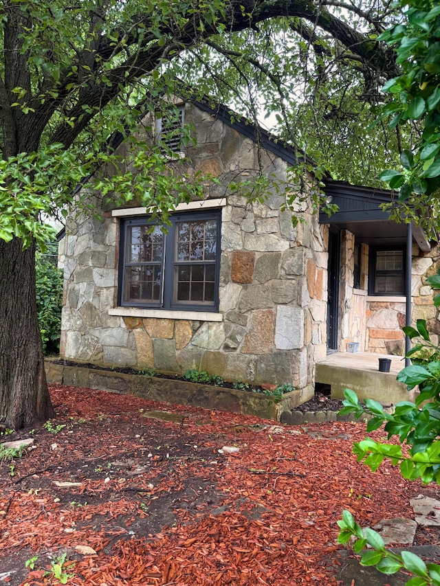 404 S 5th St, Thayer, MO 65791 - view of home's exterior featuring stone siding