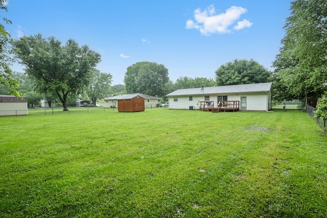 668 W Springfield St, Aurora, MO 65605 - view of yard featuring a wooden deck